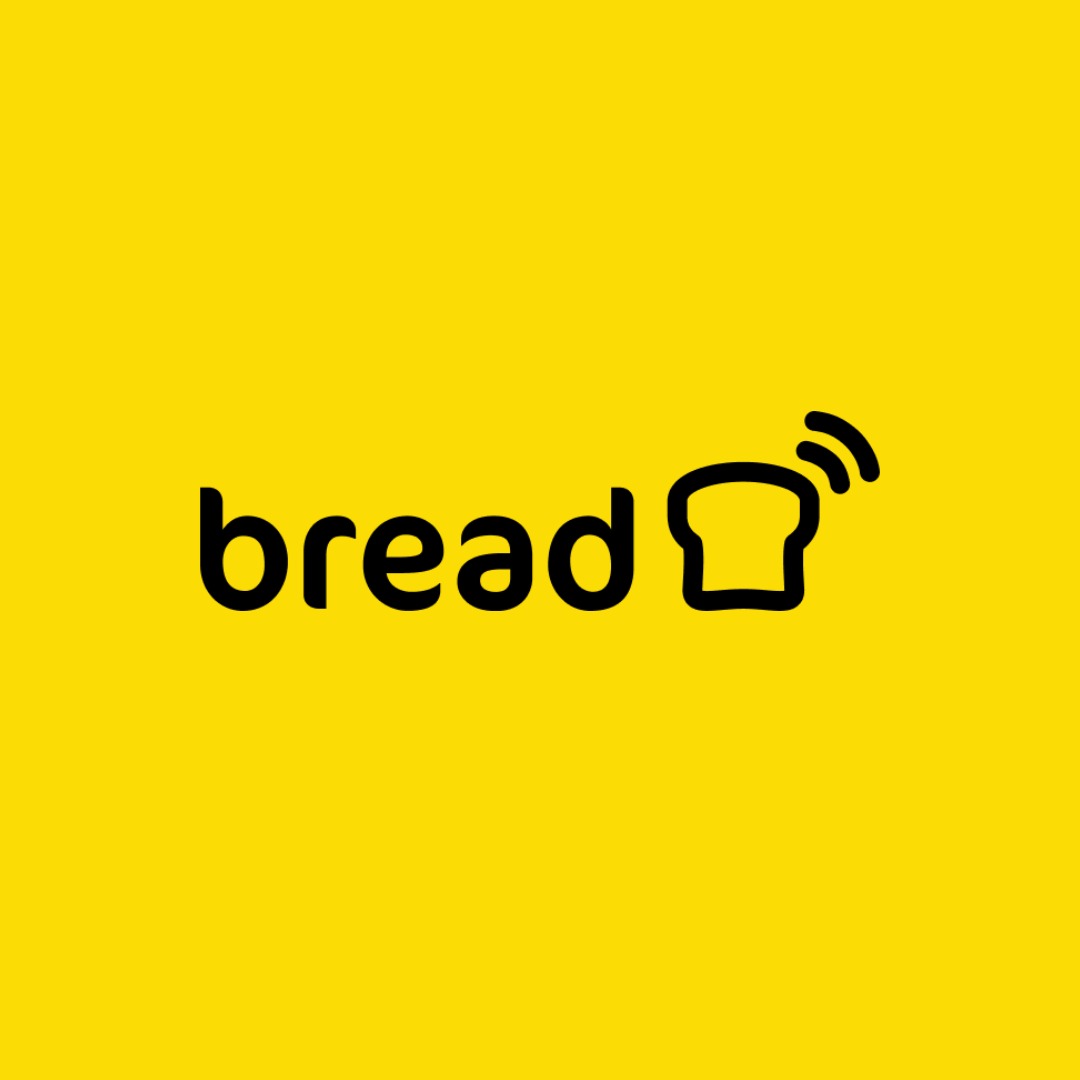 logo Bread z małą ikoną kromki chleba tostowego na intensywnym, żółtym tle